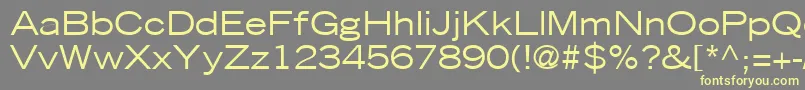 TradeGothicLtExtended Font – Yellow Fonts on Gray Background