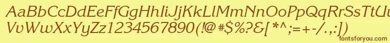 フォントKorinnacItalic – 茶色の文字が黄色の背景にあります。