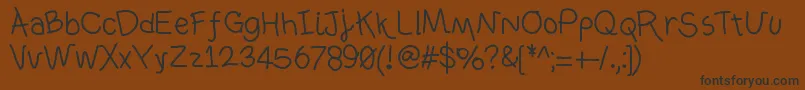 Ownhand Font – Black Fonts on Brown Background