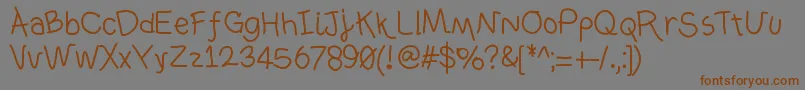 Ownhand Font – Brown Fonts on Gray Background
