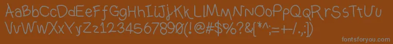 Ownhand Font – Gray Fonts on Brown Background