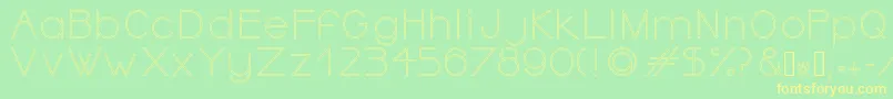 フォントOrmontOutline – 黄色の文字が緑の背景にあります