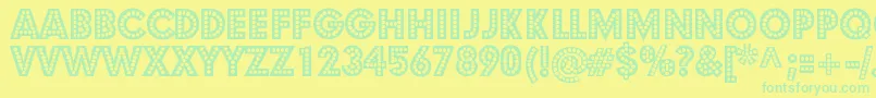 StShowtunes Font – Green Fonts on Yellow Background