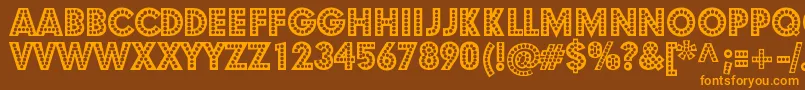 StShowtunes Font – Orange Fonts on Brown Background