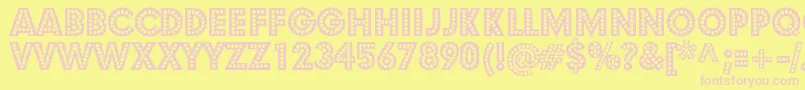 StShowtunes Font – Pink Fonts on Yellow Background