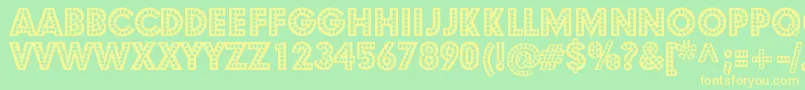 StShowtunes Font – Yellow Fonts on Green Background