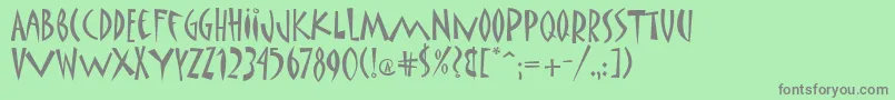 MatisseItc-Schriftart – Graue Schriften auf grünem Hintergrund