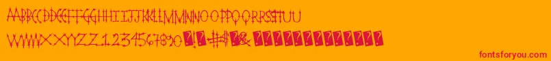 Pleasurecastlestandard-Schriftart – Rote Schriften auf orangefarbenem Hintergrund