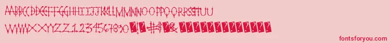 Pleasurecastlestandard Font – Red Fonts on Pink Background