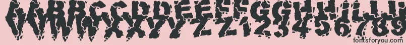VolcanicDungeon-fontti – mustat fontit vaaleanpunaisella taustalla