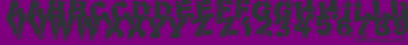 フォントVolcanicDungeon – 紫の背景に黒い文字