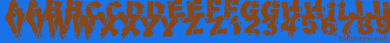 Czcionka VolcanicDungeon – brązowe czcionki na niebieskim tle