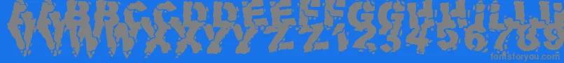 VolcanicDungeon-fontti – harmaat kirjasimet sinisellä taustalla