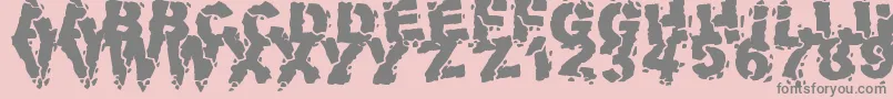 フォントVolcanicDungeon – ピンクの背景に灰色の文字