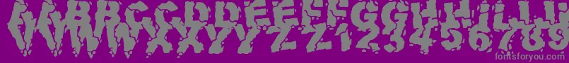VolcanicDungeon-fontti – harmaat kirjasimet violetilla taustalla