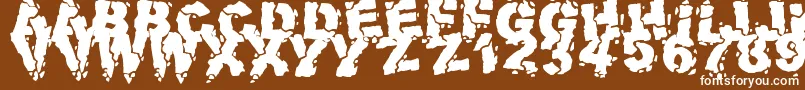 フォントVolcanicDungeon – 茶色の背景に白い文字