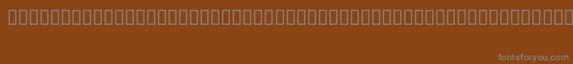 フォントShFreehand – 茶色の背景に灰色の文字