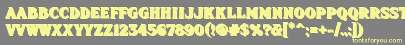 Шрифт Fhadevshnc – жёлтые шрифты на сером фоне