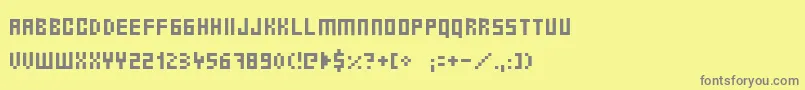 フォントErnest – 黄色の背景に灰色の文字