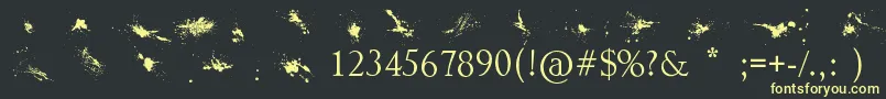 Splatter Font – Yellow Fonts on Black Background