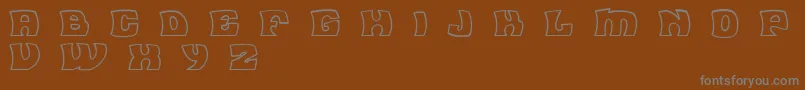 Шрифт FleaMarketOutlineBc – серые шрифты на коричневом фоне