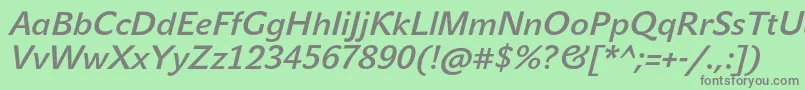 JohnsansLiteProBoldItalic-fontti – harmaat kirjasimet vihreällä taustalla