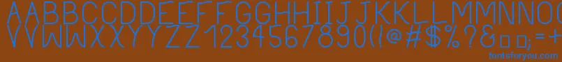 PhilippineRegular Font – Blue Fonts on Brown Background