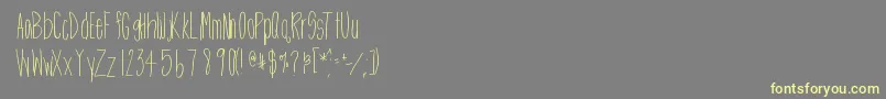 Htskinnyme Font – Yellow Fonts on Gray Background
