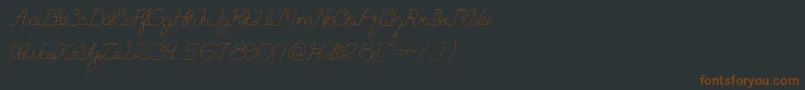 QuestionOfScience-Schriftart – Braune Schriften auf schwarzem Hintergrund