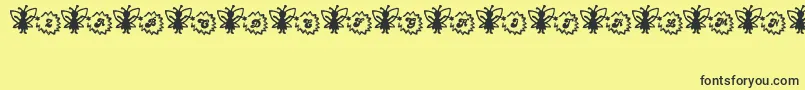 Czcionka FairySparkle – czarne czcionki na żółtym tle