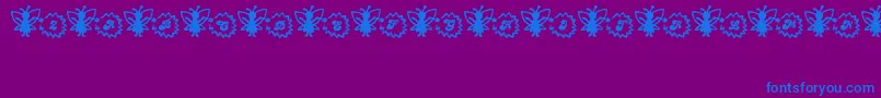 フォントFairySparkle – 紫色の背景に青い文字