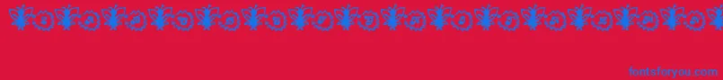 FairySparkle-Schriftart – Blaue Schriften auf rotem Hintergrund