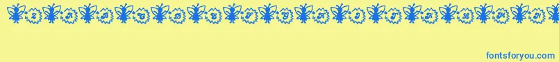 FairySparkle-Schriftart – Blaue Schriften auf gelbem Hintergrund