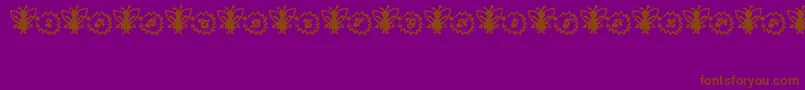 Czcionka FairySparkle – brązowe czcionki na fioletowym tle