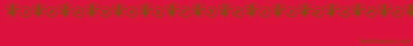 フォントFairySparkle – 赤い背景に茶色の文字