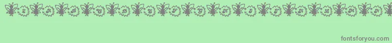 FairySparkle Font – Gray Fonts on Green Background