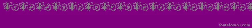 フォントFairySparkle – 紫の背景に灰色の文字