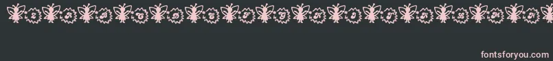 FairySparkle-fontti – vaaleanpunaiset fontit mustalla taustalla