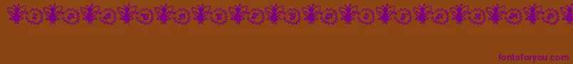 Czcionka FairySparkle – fioletowe czcionki na brązowym tle