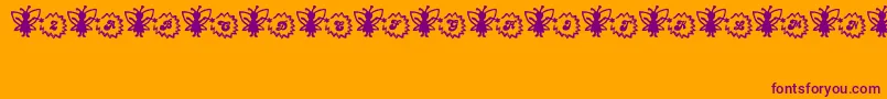 Czcionka FairySparkle – fioletowe czcionki na pomarańczowym tle