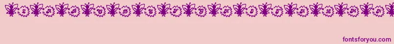 Czcionka FairySparkle – fioletowe czcionki na różowym tle
