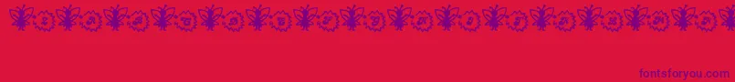 Czcionka FairySparkle – fioletowe czcionki na czerwonym tle