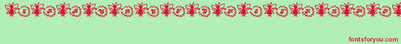 FairySparkle-fontti – punaiset fontit vihreällä taustalla