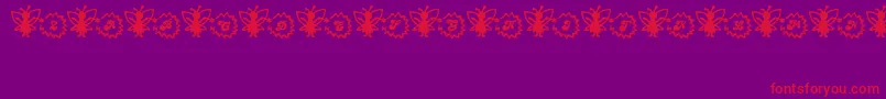 フォントFairySparkle – 紫の背景に赤い文字