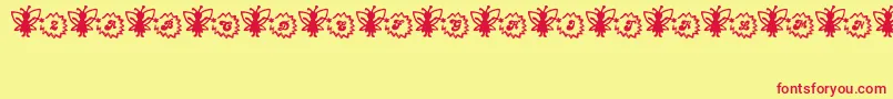 FairySparkle-Schriftart – Rote Schriften auf gelbem Hintergrund