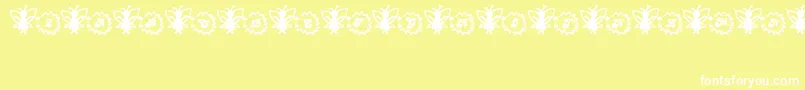 Czcionka FairySparkle – białe czcionki na żółtym tle