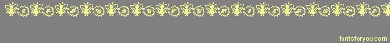Czcionka FairySparkle – żółte czcionki na szarym tle