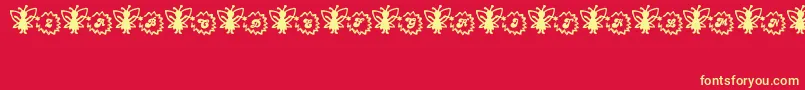 Czcionka FairySparkle – żółte czcionki na czerwonym tle
