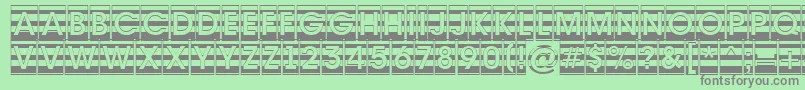 フォントAAvantecmgrdstrBold – 緑の背景に灰色の文字