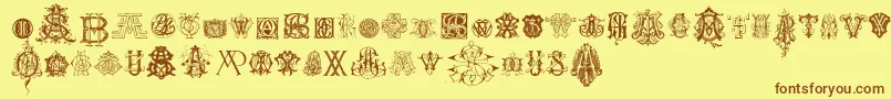 IntellectaMonogramsRandomSamplesNine-Schriftart – Braune Schriften auf gelbem Hintergrund